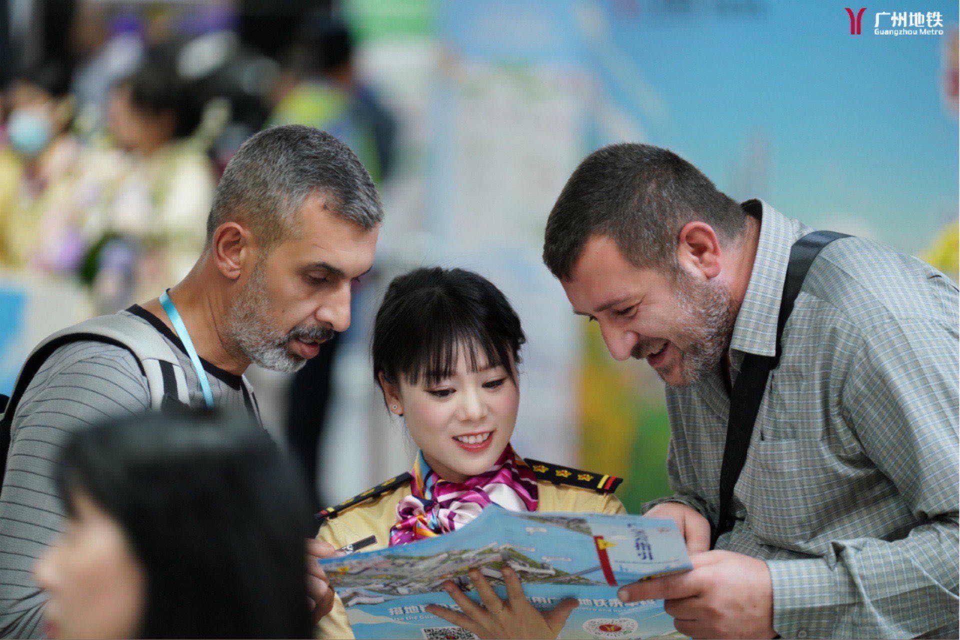 Foreign tourists take the Guangzhou Metro