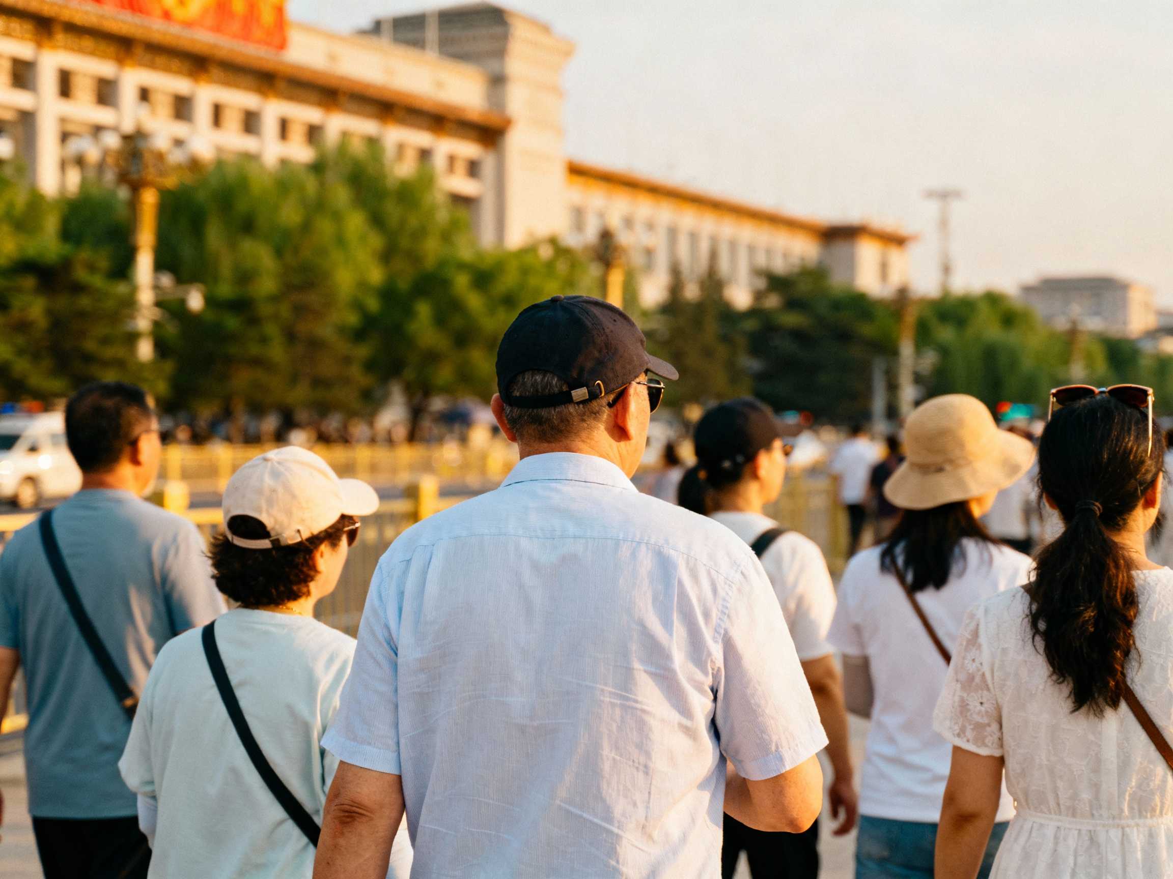 people dressed in summer clothes in beijing