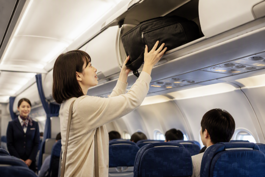 機内持込む日本人