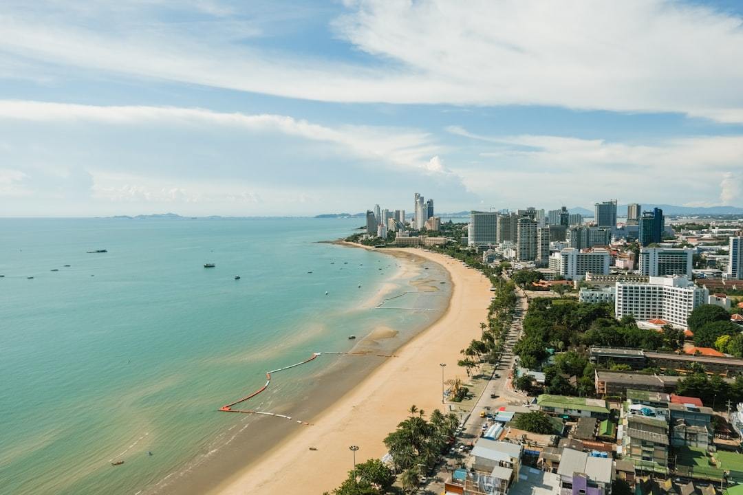 aerial view of city buildings near sea during daytime Via Unsplash (by Ryutaro Uozumi)