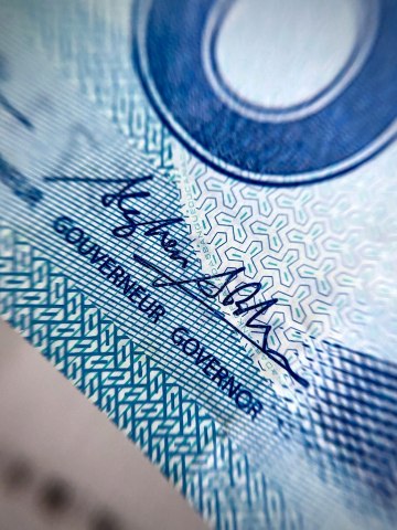 a close up of a ten dollar bill Via Unsplash (by Michael)