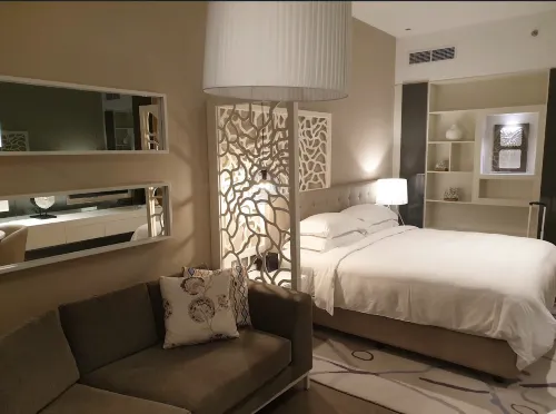 Beach Rotana Rooms Photos