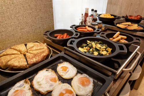 Hotel Catalonia El Retiro Dining Photos