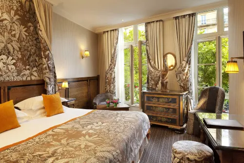 Au Manoir Saint-Germain des Prés. Chambres Photos