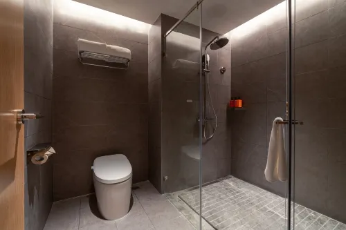 Orange Hotel Kamar Photos