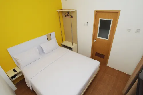 RumaRuma Hotel Kenten Palembang Chambres Photos
