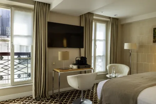 Hôtel Le Pradey - Paris - 1e arrondissement Chambres Photos