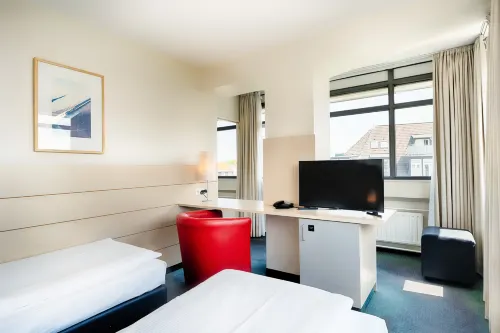 enjoy Hotel am Studio Zimmer Photos