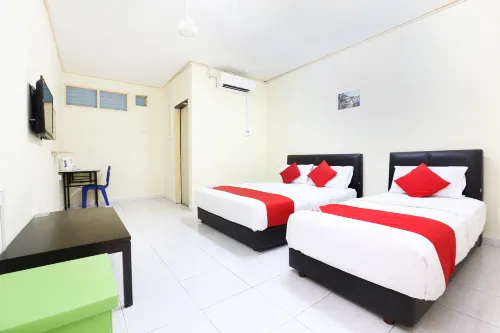 Super OYO 89640 Hotel Pelangi Marang À ne pas manquer Photos
