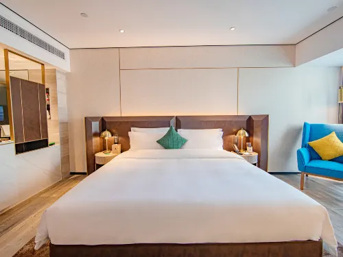 Echarm Plus Hotel (Wuxi Changjiang North Road Taihu Garden Metro Station) Kamar Photos
