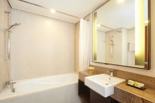Grand Santhi Hotel Kamar Photos
