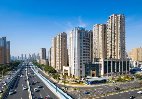 Echarm Plus Hotel (Wuxi Changjiang North Road Taihu Garden Metro Station) Eksterior Photos