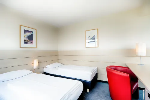 enjoy Hotel am Studio Zimmer Photos