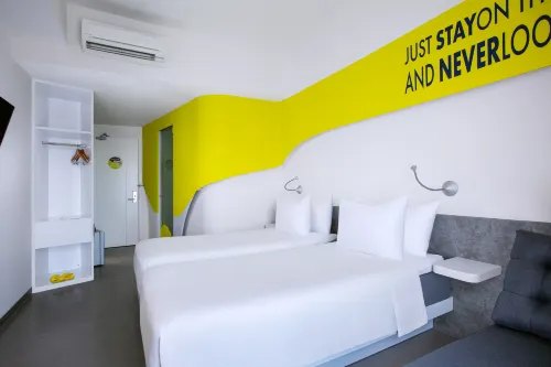 Yello Hotel Jemursari Kamar Photos