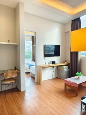 Riverbank Hotel by MRVJ BUSINESS Zimmer Photos
