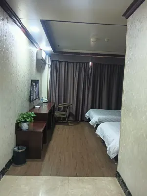 Hua Sheng Hotel Rooms Photos