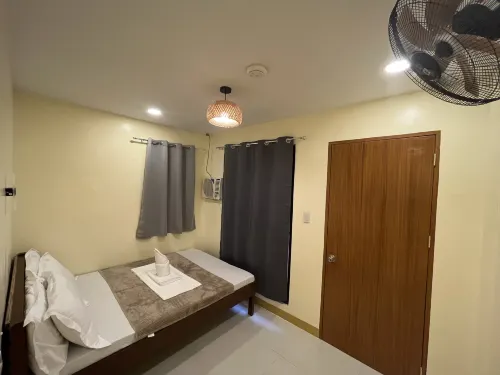 Cozy Coron Inn Chambres Photos
