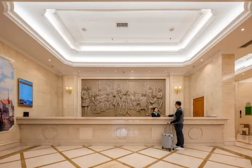 Vienna International Hotel (Guangzhou Xintang High Speed Railway Station Cowboy City Branch) Общественные зоны Photos