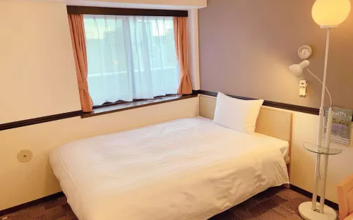 Toyoko Inn Shin-Osaka Chuo-Guchi Honkan Zimmer Photos