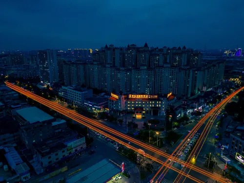 Vienna International Hotel (Guangzhou Xintang High Speed Railway Station Cowboy City Branch) Экстерьер Photos