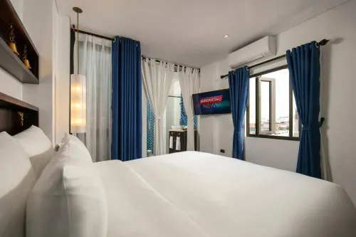 Carillon Boutique Hotel Rooms Photos