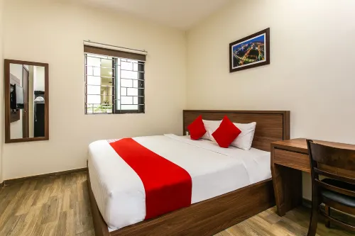 OYO 275 Senyum Inn Chambres Photos