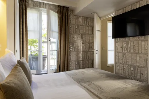 Hôtel Le Pradey - Paris - 1e arrondissement Chambres Photos