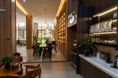 Pu'er Tea Town Inn Dining Photos
