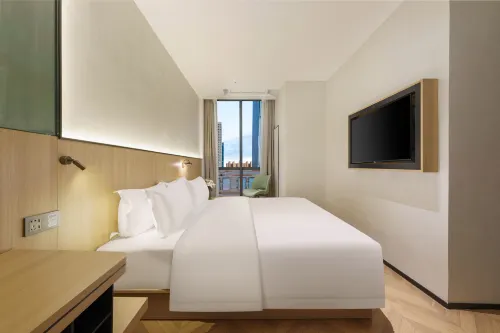 Yuexiang Huanpeng Hotel (Jingkai Wanda Plaza High-speed Railway Station) Chambres Photos