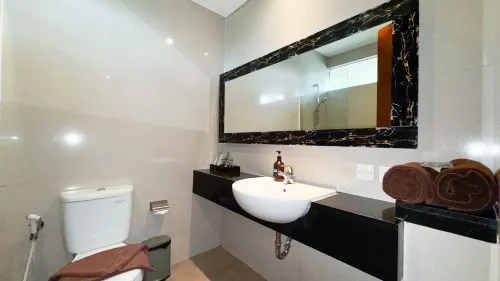 Rumah Kito Resort Hotel Jambi by Waringin Hospitality Kamar Photos