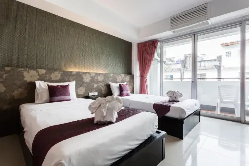 7Q Patong Beach Hotel Chambres Photos