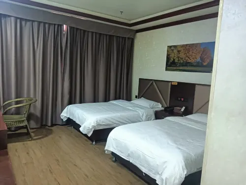 Hua Sheng Hotel Rooms Photos
