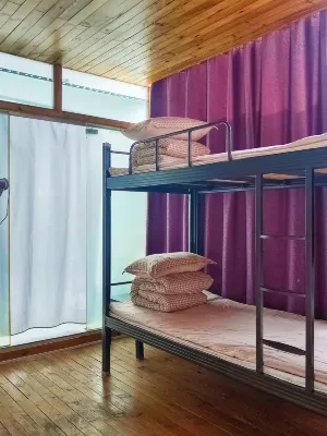 Douzhinan Youth Hostel Chambres Photos