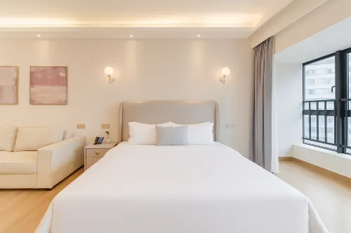 Zhaoqing · FumiFullmeCinemaBathtubDesignHotel Kamar Photos