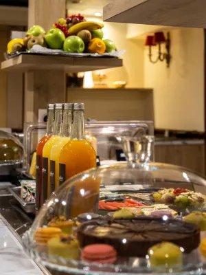 HOTEL MINERVE Restauration Photos