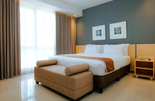 Azana Style Hotel Madura Kamar Photos
