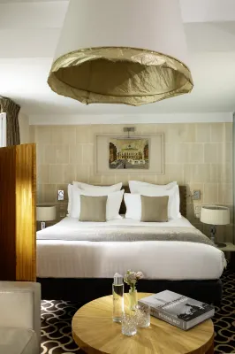 Hôtel Le Pradey - Paris - 1e arrondissement Chambres Photos