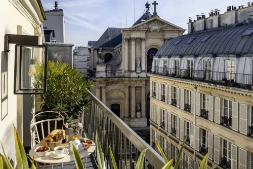 Hôtel Le Pradey - Paris - 1e arrondissement Chambres Photos