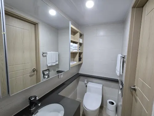 Chungchoho Best Hotel Номера Photos