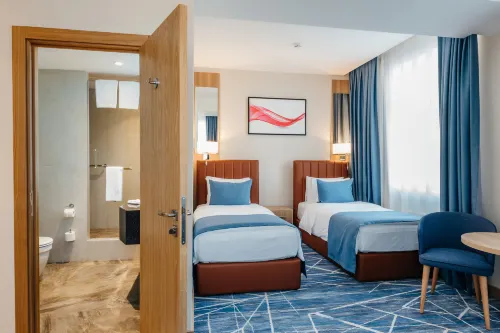 Ramada by Wyndham Astana Zimmer Photos