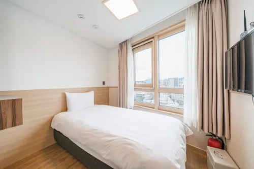 Kenny Stay Jeju Seogwipo Kamar Photos
