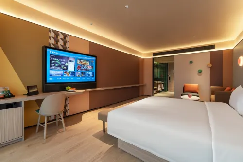 Orange Hotel Kamar Photos