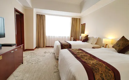 Tianyu Gloria Grand Hotel Zimmer Photos