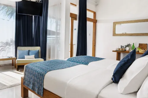 Pesona Beach Resort & Spa Huoneet Photos