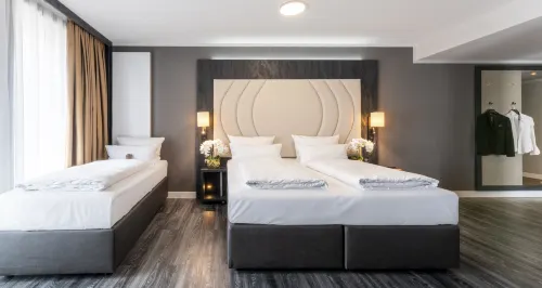 PLAZA Premium Heidelberg Rooms Photos
