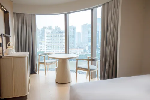 Huacheng Four Seasons Beauty Residence (Beijing Road Tianzi Wharf Store) Номера Photos