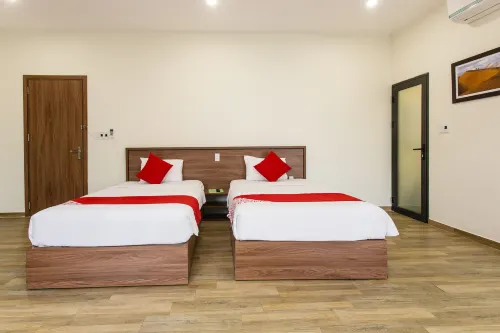 OYO 275 Senyum Inn Chambres Photos
