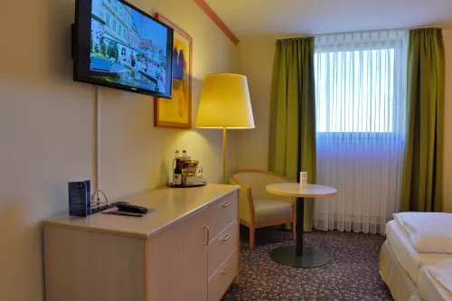 PLAZA INN Leonberg Chambres Photos