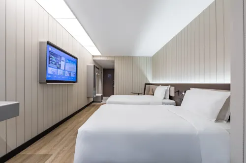 HanTing Hotel (Shanghai Qiantan Shangnan Road Subway Station) Huoneet Photos