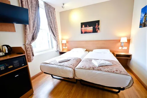 Kings Cross Inn Hotel Rum Photos